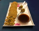 A picture of step 10 of Oats Idli Stuffed with Sprouts Moong.