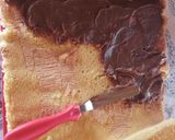 Foto del paso 5 de la receta: Arrollado de vainilla con Dulce de Leche y Ramitas de Chocolate 🍫