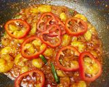 A picture of step 4 of King prawns & pointed peppers biryani.