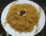 A picture of step 7 of Gur waly chawal.