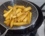 A picture of step 6 of Peri Peri Sweet Potato Fries.