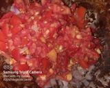 A picture of step 2 of Tomato baji.