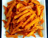 A picture of step 5 of Masala french fries.