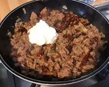 Une image de l'étape 9 de Porc aux tomates séchées, ail mariné, oignon et épices italiennes.