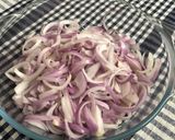 A picture of step 1 of Onion Pakoda.