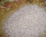 Foto del paso 5 de la receta: Arroz con maíz y Pollo frito