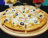 A picture of step 6 of Creamy Sauce Pizza 🍕🍕.