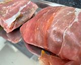 A picture of step 5 of Pesto Parma Parcels of Cod.