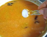 A picture of step 9 of Masala fish curry.