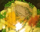 A picture of step 2 of Aalu matar dry sabji.