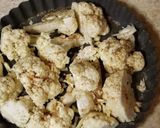 A picture of step 1 of Baked cauliflower topped with parmesan cheese.