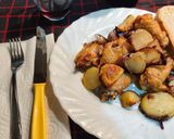 Foto del paso 7 de la receta Alitas al horno con patatas y cebolla