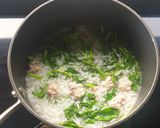 A picture of step 1 of Congee with pork mince and watercress.