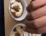 A picture of step 9 of NUTELLA SWIRL MUFFINS eggless.
