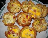 Foto del paso 7 de la receta: Canastitas de salchicha, queso y huevo para comer con la mano