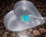 A picture of step 5 of Double Heart cake.