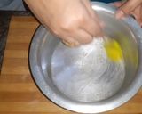 A picture of step 3 of Eggless Doll cake pineappple flavour.