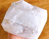 Hình bước làm 3 của món Papillote De Cabillaud - Cá Tuyết Gói Giấy Đút Lò Với Lá Thơm Provence & Dầu Olive