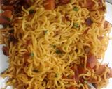 A picture of step 4 of Saucy Sausage noodles.