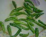 A picture of step 1 of Hari mirch ka Achar.