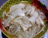 A picture of step 3 of Southern Thai Sour Curry with Salmon Head and Pickled Bamboo Shoots.
