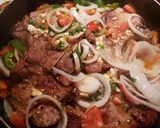 A picture of step 2 of Pork chops with tomatoes and onions and jalapenos.