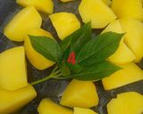 A picture of step 3 of Buttered potatoes suya wadges.