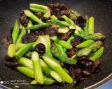 A picture of step 3 of Stir fry Asparagus with black fungus.