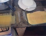 A picture of step 6 of Mixed Meat, Ham, and Cheese Lasagna.