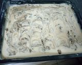 A picture of step 3 of Cinnabon Cinnamon Roll Cake.