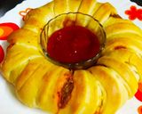 A picture of step 7 of Paneer stuffed ring bread.