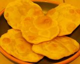 A picture of step 1 of Paal Poori (Poori soaked in milk).