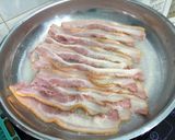 A picture of step 1 of Bacon And Onion In BBQ Sauce Open Sandwich.