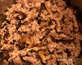 A picture of step 5 of Easy Braised Pork with Shiitake Mushrooms.