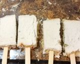 A picture of step 4 of Bread Eggs Lollipop French Toast.