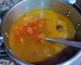 Foto del paso 18 de la receta Garbanzos y langostinos con reducción de las cabezas