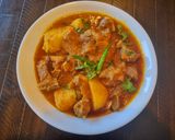A picture of step 4 of Spicy Mutton Masala or Aloo Gosht.