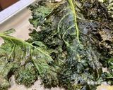 A picture of step 6 of Crispy Kale Chips.