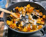 A picture of step 13 of Eggplant Curry with Mushrooms, Tomatoes, and Coconut Milk.