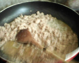 Foto del paso 5 de la receta: Arroz capeado con carne y queso