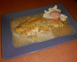 Foto del paso 7 de la receta: Panga al horno en salsa de ajo y limón