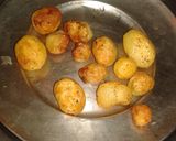 A picture of step 4 of Baby Potatoes Simmered In Rich Onion Tomato Gravy.