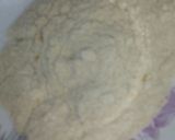 A picture of step 3 of Yam Balls in breadcrumbs.