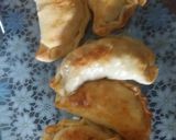 Foto del paso 2 de la receta: Tortilla al horno con relleno de empanadas de jamón y queso y de carne