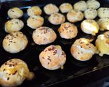 Foto del paso 8 de la receta: Pancitos de ajo rellenos de queso
