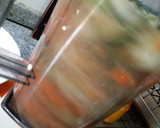 A picture of step 3 of Carrot and cucumber juice.