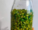 A picture of step 4 of Raita marcha / pickled green chillies.