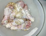 A picture of step 1 of Honey and ketchup glanced chicken drumsticks.