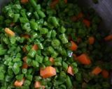 A picture of step 2 of Fried French beans.