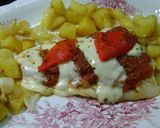 Foto del paso 11 de la receta: Merluza a la pizza con papas crocantes